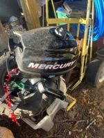 New never used black mercury boat motor